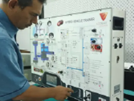 Shuttle bus transporting workers from hostel to Perak factory