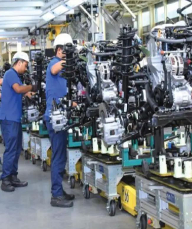 PHCDC workers assembling electronics at Malaysian E&E factory